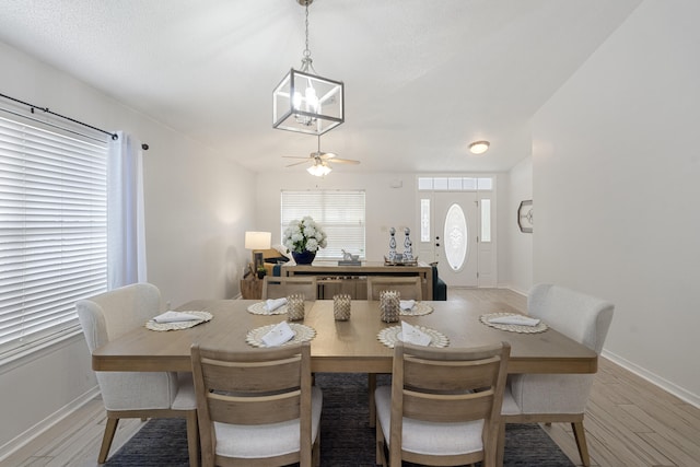 119 Red Bay Ct, Santa Rosa Beach, FL 32459 - dining area with light wood-style floors, baseboards, and a ceiling fan