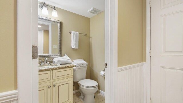 520 N Richard Jackson Blvd Unit 952, Panama City Beach, FL 32407 - bathroom with visible vents, toilet, tile patterned flooring, and vanity
