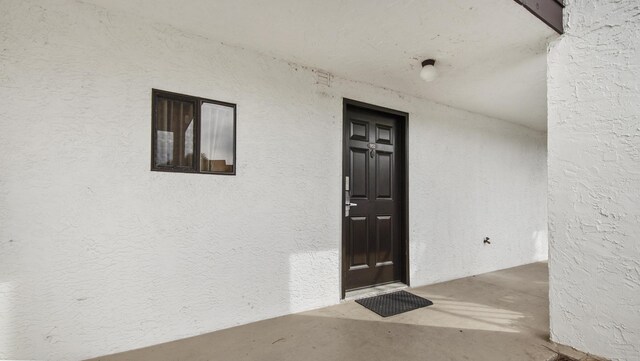 520 N Richard Jackson Blvd Unit 952, Panama City Beach, FL 32407 - doorway to property featuring stucco siding