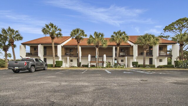 520 N Richard Jackson Blvd Unit 952, Panama City Beach, FL 32407 - view of building exterior featuring uncovered parking
