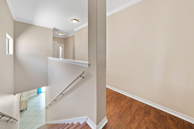 229 Inverrary Dr, Destin, FL 32541 - stairs with baseboards, ornamental molding, and wood finished floors