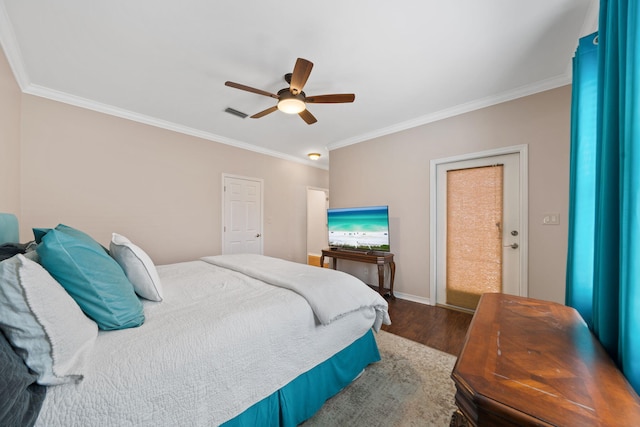 229 Inverrary Dr, Destin, FL 32541 - bedroom with baseboards, ceiling fan, ornamental molding, and wood finished floors