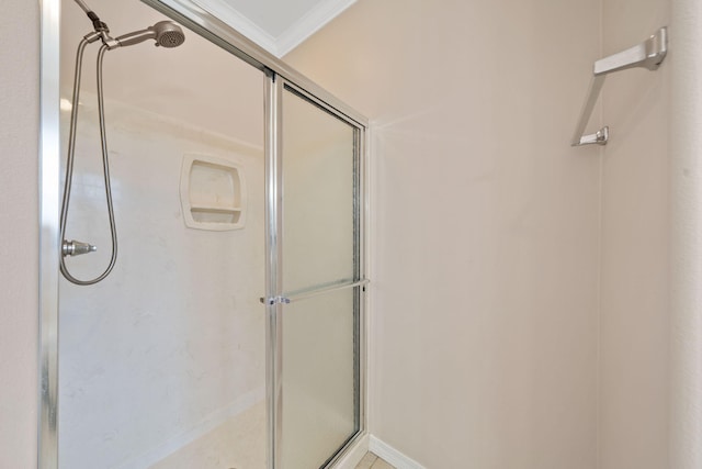 229 Inverrary Dr, Destin, FL 32541 - bathroom featuring crown molding and a shower stall