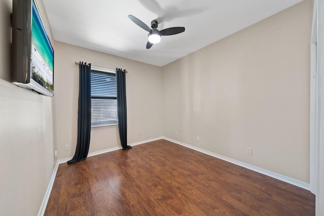 229 Inverrary Dr, Destin, FL 32541 - unfurnished room featuring baseboards, ceiling fan, and wood finished floors