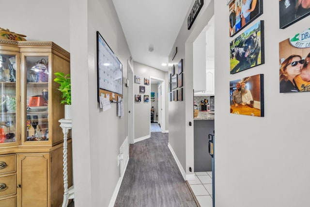 2542 Edgewood Dr, Navarre, FL 32566 - hall with baseboards, wood finished floors, and recessed lighting