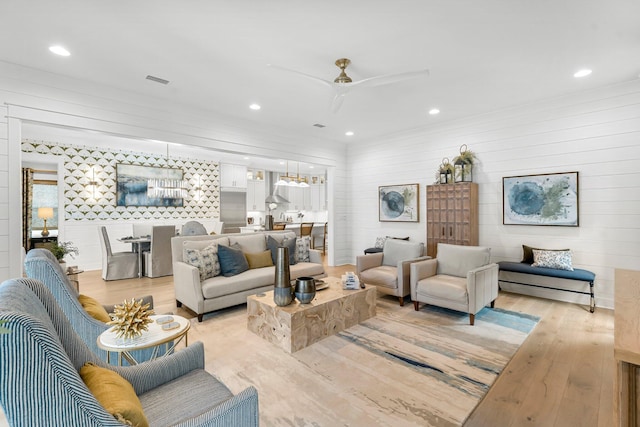 10 Basal St, Inlet Beach, FL 32461 - living room featuring light wood-style flooring, recessed lighting, ceiling fan, and wood walls