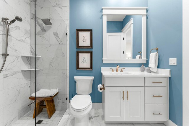 10 Basal St, Inlet Beach, FL 32461 - bathroom with marble finish flooring, a marble finish shower, toilet, and vanity