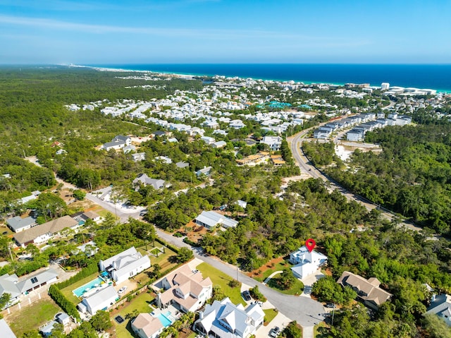 79 Blue Coral Dr W, Santa Rosa Beach, FL 32459 - aerial overview of property's location with a large body of water and a heavily wooded area