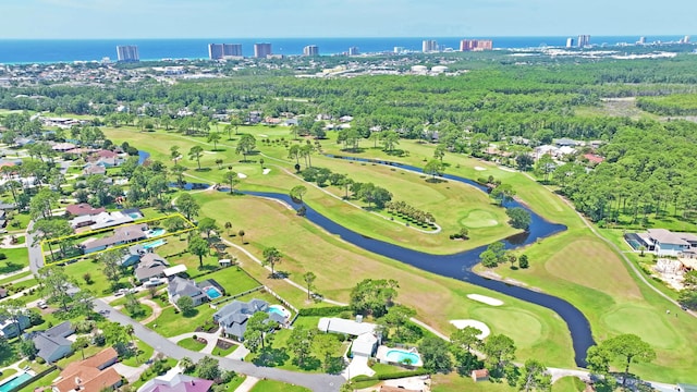 drone / aerial view featuring a water view and golf course view