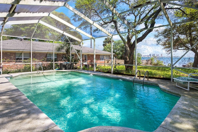 outdoor pool featuring a lanai