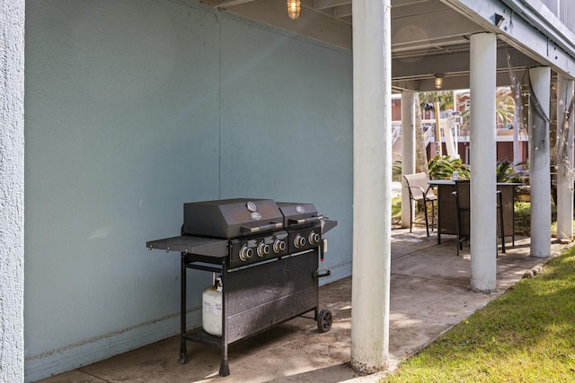 view of patio featuring a grill