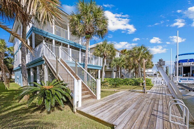wooden deck featuring stairs