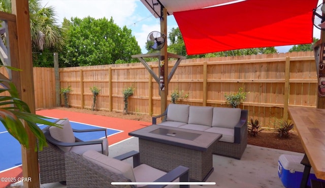 view of patio / terrace featuring a fenced backyard and outdoor lounge area