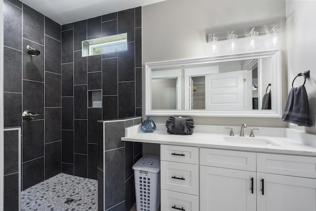 bathroom featuring vanity and walk in shower