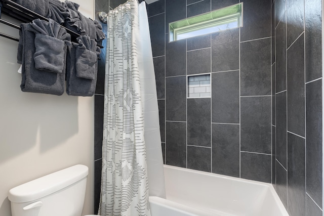 bathroom with shower / bathtub combination with curtain and toilet
