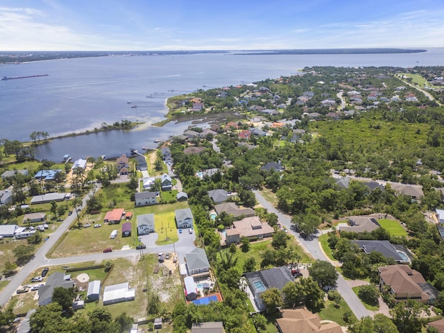 birds eye view of property featuring a water view and a residential view