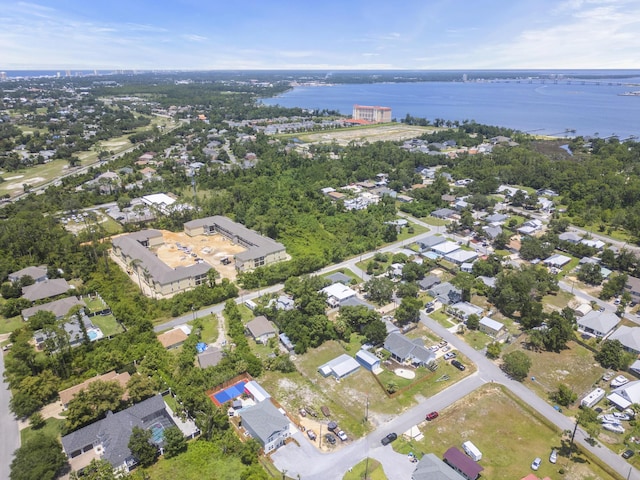 bird's eye view with a water view and a residential view