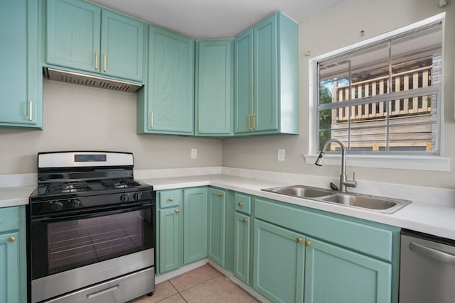 255 Brackin St, Crestview, FL 32539 - kitchen with a sink, appliances with stainless steel finishes, light tile patterned floors, and light countertops