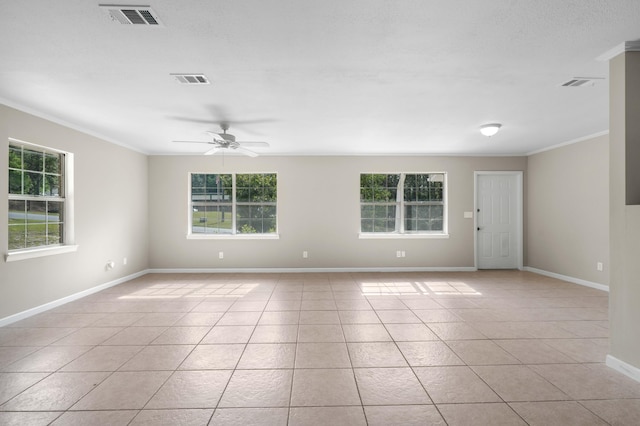 255 Brackin St, Crestview, FL 32539 - empty room featuring visible vents, crown molding, and light tile patterned floors
