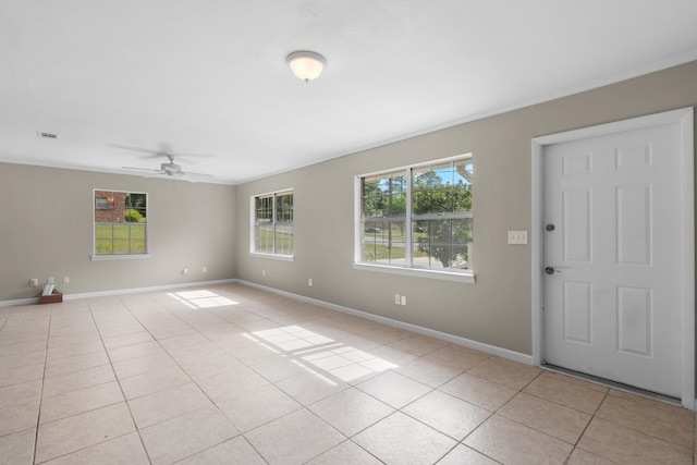 255 Brackin St, Crestview, FL 32539 - interior space with baseboards, a ceiling fan, and light tile patterned floors