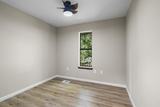255 Brackin St, Crestview, FL 32539 - unfurnished room featuring visible vents, a ceiling fan, baseboards, and wood finished floors
