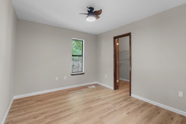 255 Brackin St, Crestview, FL 32539 - unfurnished room featuring visible vents, a ceiling fan, baseboards, and light wood-type flooring