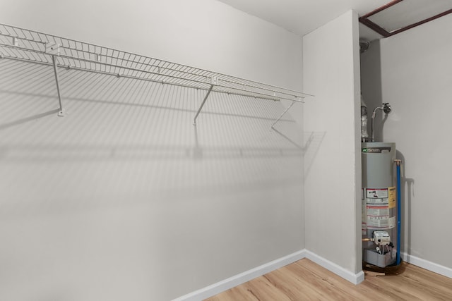 255 Brackin St, Crestview, FL 32539 - walk in closet with water heater and light wood-type flooring