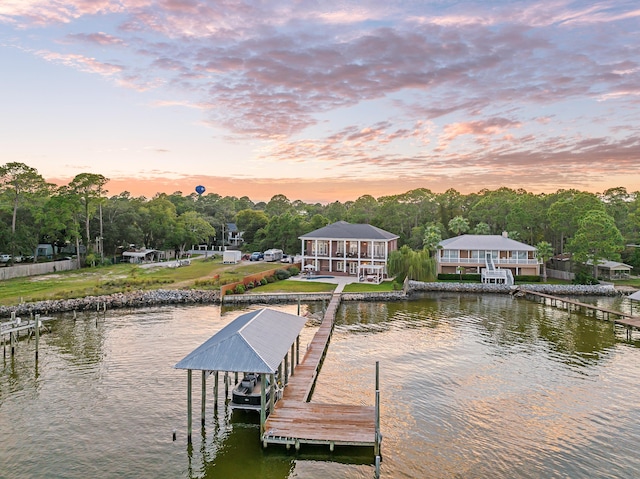 dock area featuring a water view and boat lift