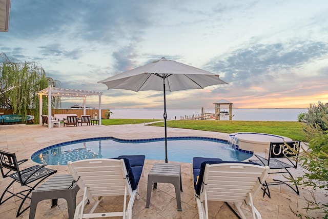view of swimming pool featuring fence, a pergola, a patio, a water view, and a yard