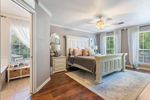 bedroom featuring crown molding, a ceiling fan, dark wood-style flooring, and baseboards
