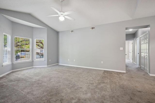 1501 N Partin Dr Unit 210, Niceville, FL 32578 - spare room featuring visible vents, carpet flooring, and ceiling fan