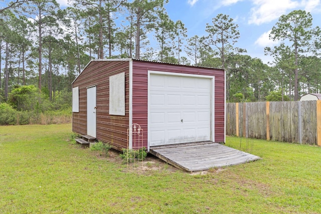 garage with fence