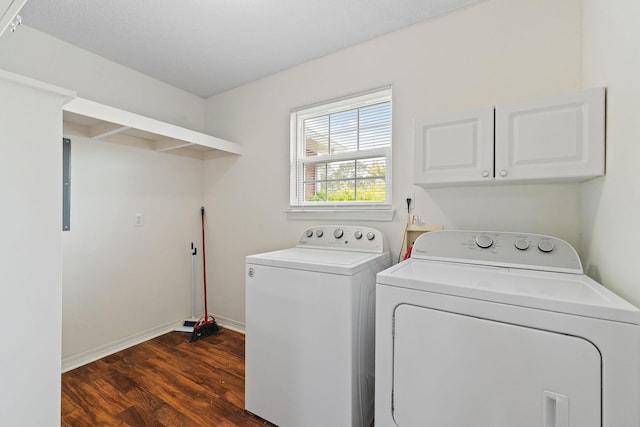 clothes washing area with baseboards, cabinet space, dark wood-type flooring, and independent washer and dryer