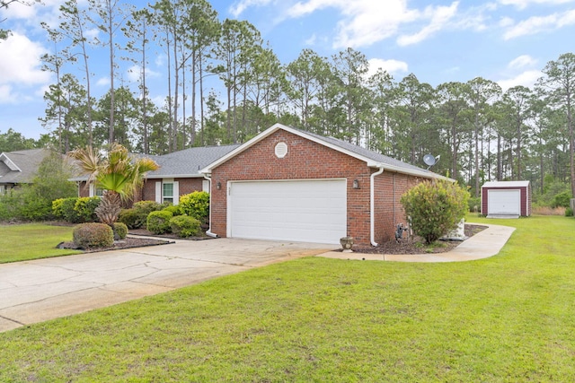 ranch-style home with a garage, brick siding, and a front yard