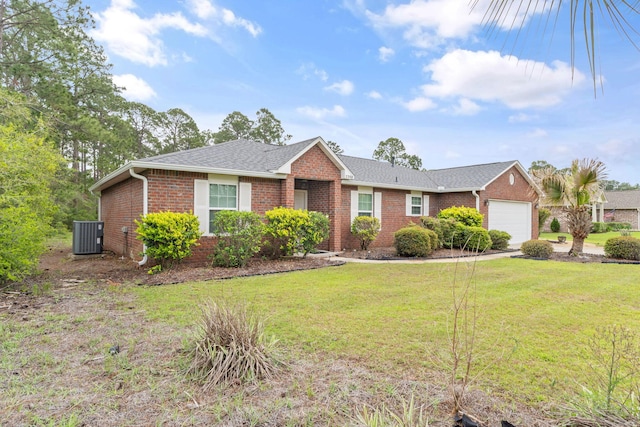 ranch-style house featuring a front yard, roof with shingles, an attached garage, and brick siding