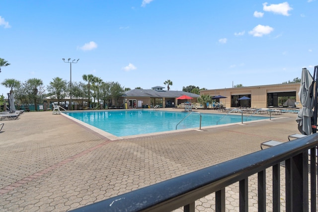 pool featuring a patio area