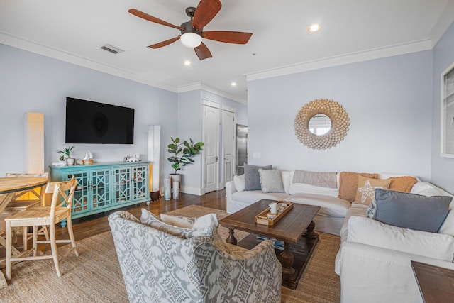 living room featuring recessed lighting, wood finished floors, ornamental molding, visible vents, and a ceiling fan