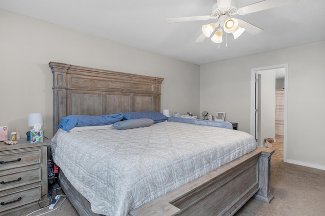 1207 Jefferyscot Dr, Crestview, FL 32536 - bedroom featuring a ceiling fan, light carpet, and baseboards