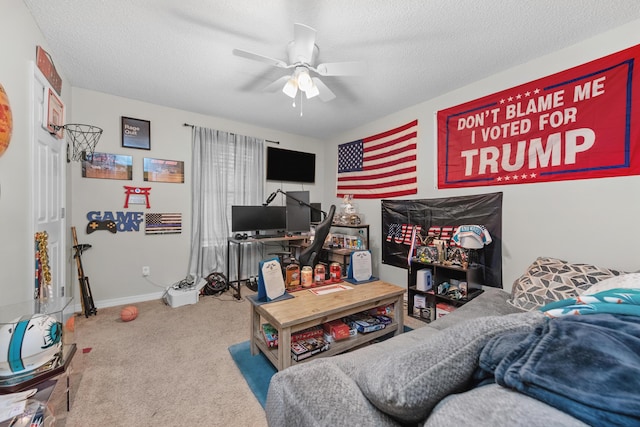 1207 Jefferyscot Dr, Crestview, FL 32536 - carpeted bedroom with a textured ceiling, ceiling fan, and baseboards