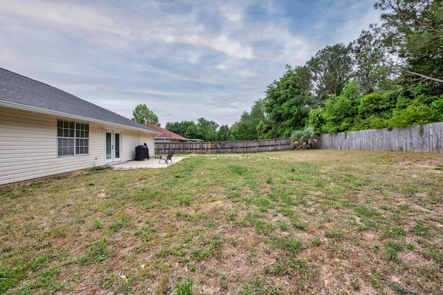 1207 Jefferyscot Dr, Crestview, FL 32536 - view of yard featuring french doors, a fenced backyard, and a patio area