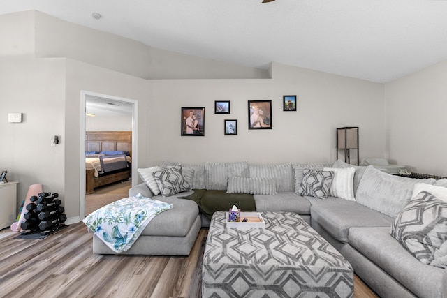 1207 Jefferyscot Dr, Crestview, FL 32536 - living area featuring baseboards, lofted ceiling, and light wood-style floors