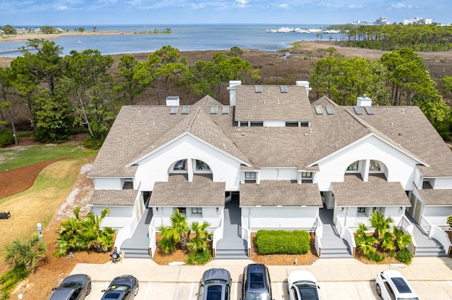 drone / aerial view with a water view