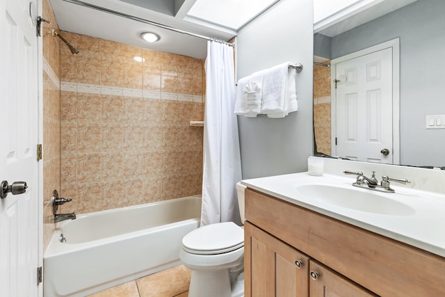 full bath featuring shower / bath combo, vanity, toilet, and tile patterned flooring