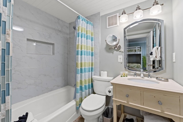 bathroom featuring toilet, shower / bath combination with curtain, visible vents, and vanity