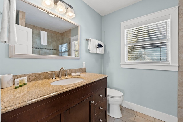 full bathroom featuring walk in shower, tile patterned floors, toilet, vanity, and baseboards