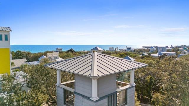 exterior space with a water view