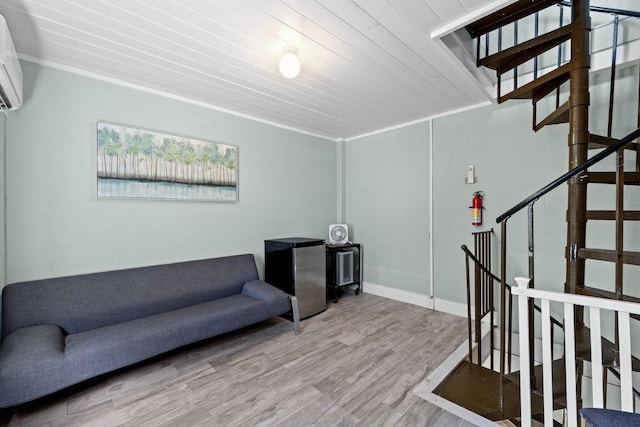 interior space featuring wooden ceiling, stairway, and wood finished floors