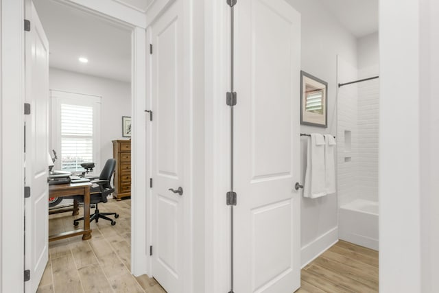 corridor featuring recessed lighting and light wood-type flooring