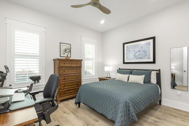 bedroom featuring baseboards, recessed lighting, light wood-style flooring, and a ceiling fan