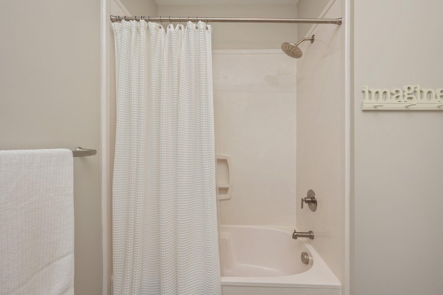 full bath featuring shower / bath combo with shower curtain